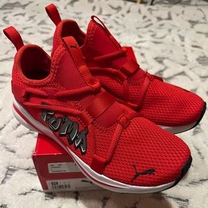 New. Never worn. Puma kid shoes size 5.
